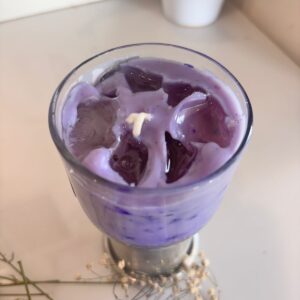 Lavender latte candle in glass jar with soy wax and cotton wick