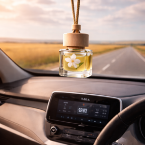 jasmine scented car diffuser hangs inside car